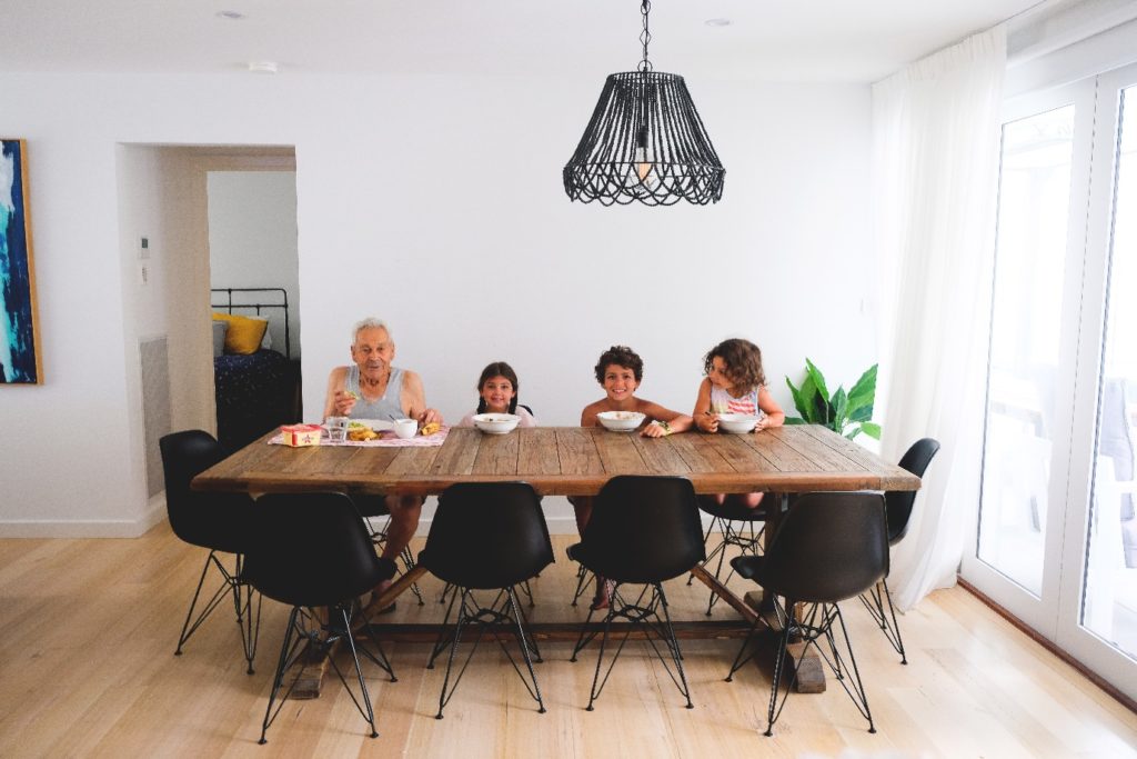 The Curcio Family eating together at their dining table